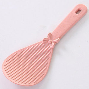 Xingcheng Modern Kitchen Supply New Material Meal Rice Spoon with Cute Bowknot Decorated Wheat Smell Eco-friendly Dinner Spoon